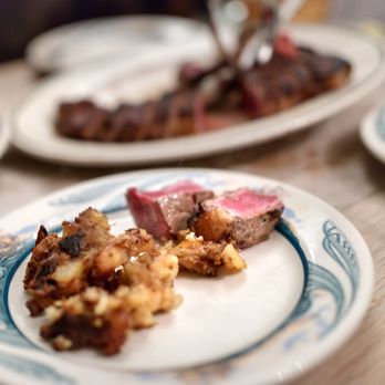 Peter Luger - Luger's Special German Fried Potatoes (for 2) $12.95 as served by waiter, with 2 raw pieces of steak... I mean "medium rare" - Steakhouses Near Me - Brooklyn, New York Peter Luger - Luger's Special German Fried Potatoes (for 2) $12.95 as served by waiter, with 2 raw pieces of steak... I mean "medium rare" - Steakhouses Near Me - Brooklyn, New York