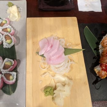 Sushi Time - Sakura roll on left, hamachi sashimi in the middle, arigato roll on right - Sushi Bars Near Me - Seaside, California Sushi Time - Sakura roll on left, hamachi sashimi in the middle, arigato roll on right - Sushi Bars Near Me - Seaside, California