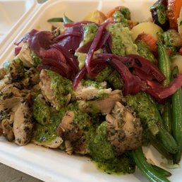 Roasted chicken, rice, rainbow carrots, green beans, pickled onions, avocado bean dip, chimichurri sauce