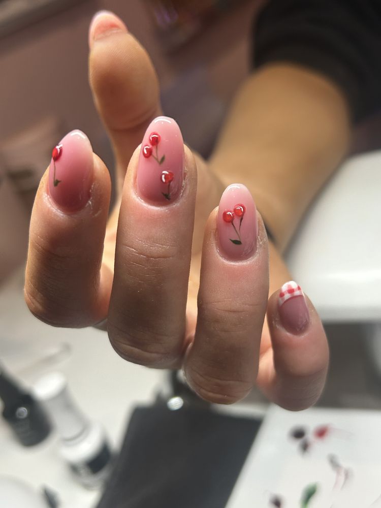 Kaitlynnails303 Logo