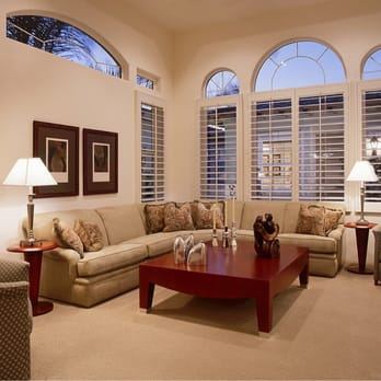 Sullivan's Shutter & Stone Factory - Classic 4.5" Louvers provide sun protection and ambiance in this living area - Shades & Blinds Near Me - Indio, California Sullivan's Shutter & Stone Factory - Classic 4.5" Louvers provide sun protection and ambiance in this living area - Shades & Blinds Near Me - Indio, California