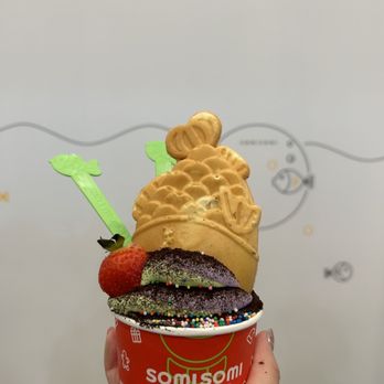 Somisomi - ube / matcha swirl with custard filled taiyaki (fish waffle, oreo crumbs, sprinkles, and a strawberry - Ice Cream & Frozen Yogurt Near Me - Ontario, California Somisomi - ube / matcha swirl with custard filled taiyaki (fish waffle, oreo crumbs, sprinkles, and a strawberry - Ice Cream & Frozen Yogurt Near Me - Ontario, California