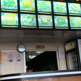 Winon Chinese Food - a counter with a clock - Chinese Near Me - Commack, New York