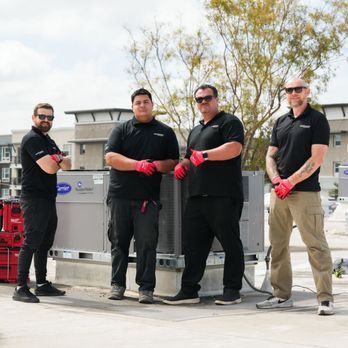 True North Heating & Air - Our True North team on a commercial rooftop in Irvine preparing equipment for installation. - Heating & Air Conditioning/HVAC Near Me - Irvine, California