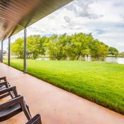 Texas Ranch RV Resort - Clubhouse & one of several ponds