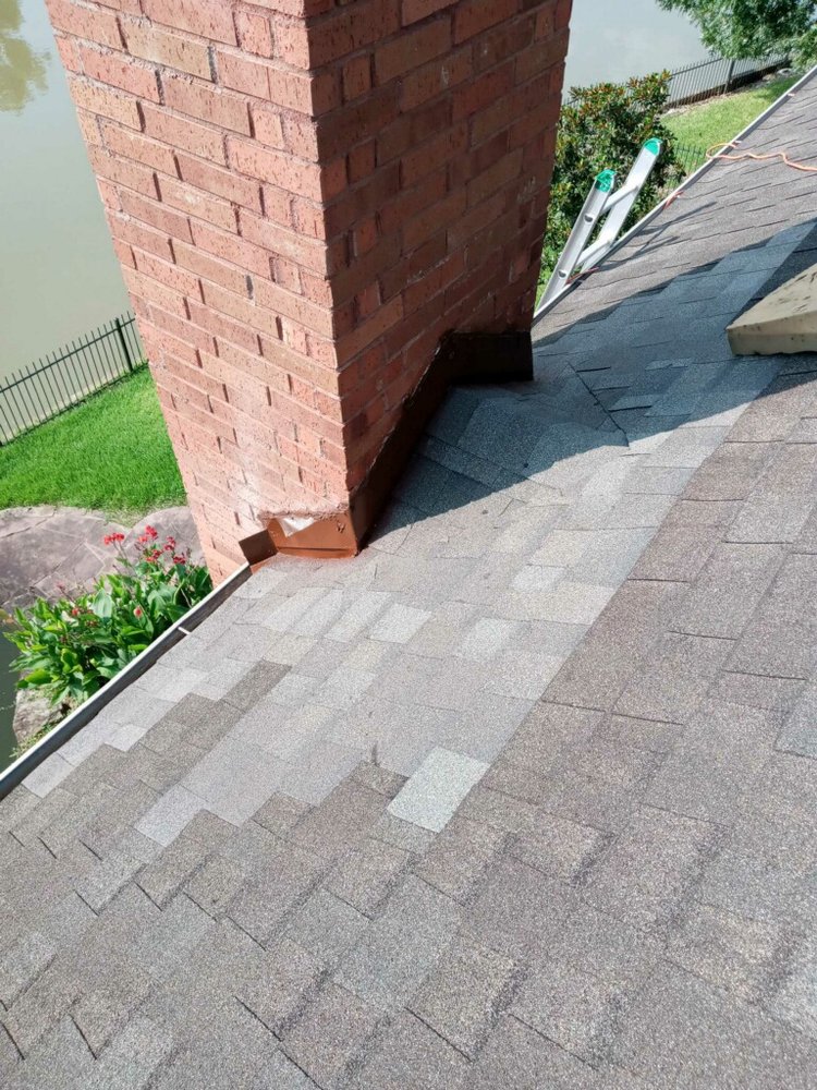 Slide of Our Lady Roofing Construction