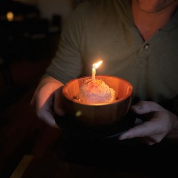 Porzana - Lavender ricotta gelato with a birthday candle - Steakhouses Near Me - Minneapolis, Minnesota Porzana - Lavender ricotta gelato with a birthday candle - Steakhouses Near Me - Minneapolis, Minnesota