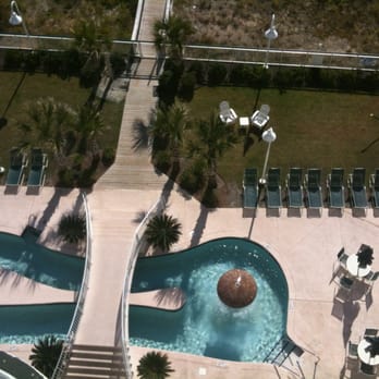 Hampton Inn & Suites Myrtle Beach/Oceanfront - Partial view of one of the several pools. - Hotels Near Me - Myrtle Beach, South Carolina Hampton Inn & Suites Myrtle Beach/Oceanfront - Partial view of one of the several pools. - Hotels Near Me - Myrtle Beach, South Carolina