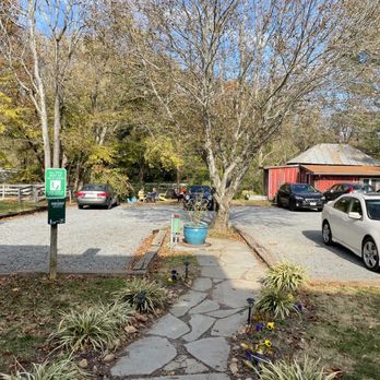 Before & After - View from right outside the cafe. Parking lot and outdoor seating area - Coffee & Tea Near Me - Sperryville, Virginia