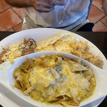 Mi Pueblito Cafe - Chilaquiles Verdes with eggs, refried beans and hash browns. - Mexican Near Me - El Paso, Texas Mi Pueblito Cafe - Chilaquiles Verdes with eggs, refried beans and hash browns. - Mexican Near Me - El Paso, Texas