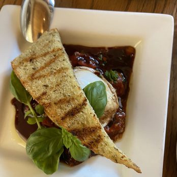 Bistro Restaurant & Bar - Burrata- with a braised pear tomato ragout. - Bars Near Me - Cannon Beach, Oregon Bistro Restaurant & Bar - Burrata- with a braised pear tomato ragout. - Bars Near Me - Cannon Beach, Oregon