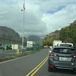 Young Brothers, Limited - Cars and trucks all lined up outside, due to last night's tsunamiscare. Still closed & waiting...