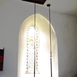 Greatham Church - West window and bell ropes