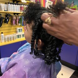 Teaching daughter to take care of her own hair