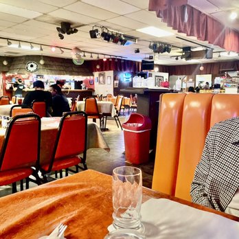 La Fiesta Restaurant - a man sitting at a table - Mexican Near Me - Denver, Colorado La Fiesta Restaurant - a man sitting at a table - Mexican Near Me - Denver, Colorado