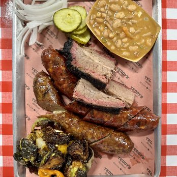 Teddy’s Barbecue - 3 meat plate with brisket, jalapeño/cheddar sausage, and green chile chorizo sausage. Beans and brussels sprouts for sides. - Barbeque Near Me - Weslaco, Texas Teddy’s Barbecue - 3 meat plate with brisket, jalapeño/cheddar sausage, and green chile chorizo sausage. Beans and brussels sprouts for sides. - Barbeque Near Me - Weslaco, Texas
