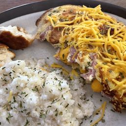 Ham and cheese omelette with grits Ham and cheese omelette with grits