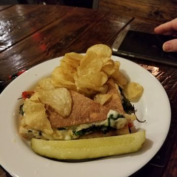 Hardware Store Brewing - Pressed tomato and mozzarella sandwich with kettle cooked chips - New American Near Me - Titusville, Florida Hardware Store Brewing - Pressed tomato and mozzarella sandwich with kettle cooked chips - New American Near Me - Titusville, Florida