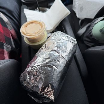 LJ’s Lil’ Cafe - OG breakfast burrito on the center console for size comparison - Breakfast & Brunch Near Me - Cypress, California