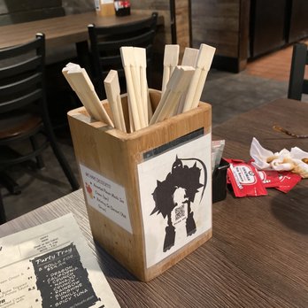 Sei Sushi - Open chopsticks sitting in open containers on each table - Sushi Bars Near Me - San Diego, California
