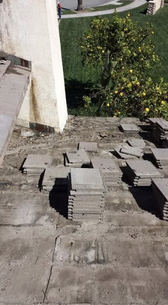 Slide of Romero's Roofing