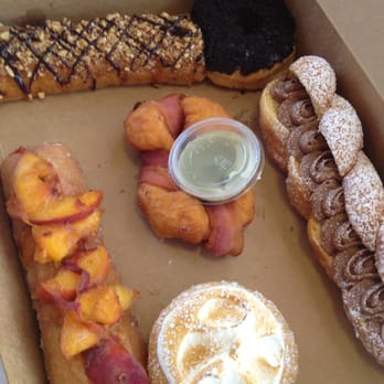 Dutch Monkey Doughnuts - Nutella, maple bacon, lemon meringue, salted caramel, Dutch crumb, peach buttermilk - Donuts Near Me - Cumming, Georgia