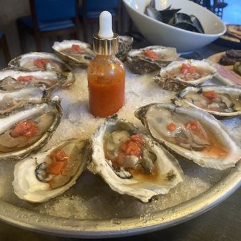 Baker's Wife Bistro - Dozen Local Oysters (Seasonal Mignonette (diced strawberries) w/ House Hot sauce) - French Near Me - Hampton, Virginia Baker's Wife Bistro - Dozen Local Oysters (Seasonal Mignonette (diced strawberries) w/ House Hot sauce) - French Near Me - Hampton, Virginia