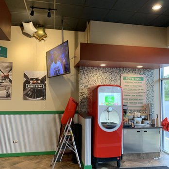 Wingstop - a red vending machine in a restaurant - Chicken Wings Near Me - Gurnee, Illinois Wingstop - a red vending machine in a restaurant - Chicken Wings Near Me - Gurnee, Illinois