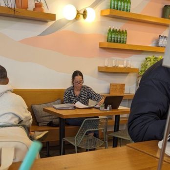 Everyday Eatery - The manager Tatiana taking up a 4-top during lunch rush when paying customers have no place to sit. - Cafes Near Me - Irvine, California