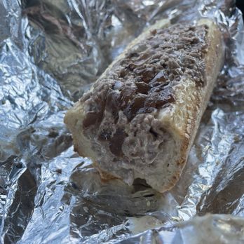 The Violet Stone - $16.75 cheesesteak with caramelized onions (halved & separately wrapped) - Pizza Near Me - St. Petersburg, Florida