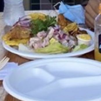 Cilantro 27 - Ceviche platter with calamari, fried shrimp, fried fish, and patacones - Latin American Near Me - Miami, Florida Cilantro 27 - Ceviche platter with calamari, fried shrimp, fried fish, and patacones - Latin American Near Me - Miami, Florida