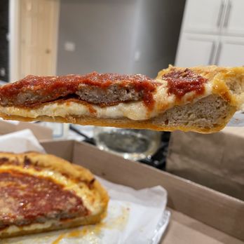 Gio's Chicago Pizza - Cicero Combo Deep Dish Pizza (Looks thin in this pic... is was not. The sausage is super thick and was really well spiced!) - Pizza Near Me - Nashville, Tennessee Gio's Chicago Pizza - Cicero Combo Deep Dish Pizza (Looks thin in this pic... is was not. The sausage is super thick and was really well spiced!) - Pizza Near Me - Nashville, Tennessee