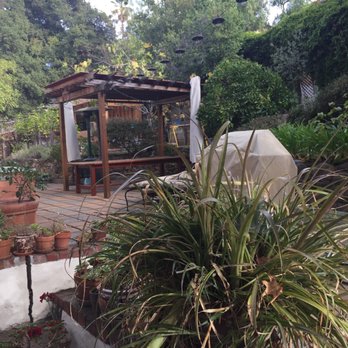Manicure Gardening Services - a patio with a gazebo - Landscaping Near Me