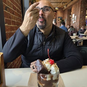 Ghirardelli Chocolate Experience - He couldn't wait to dig in!! - Chocolatiers & Shops Near Me - San Francisco, California