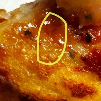 Bella Italia - Hair baked into our large Hawaiian pizza - Italian Near Me - Modesto, California