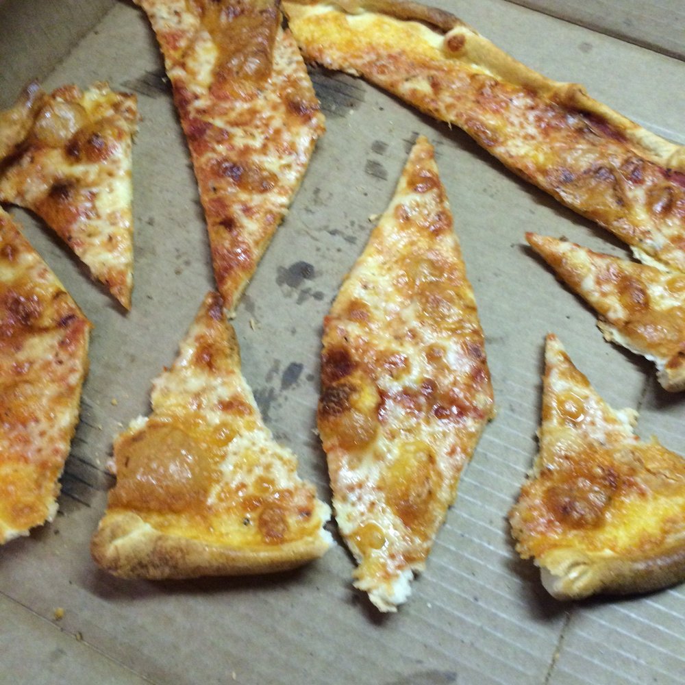 Nick's Pizza Palace - The cheese pizza and this is how it was cut for delivery! - Pizza Near Me - Owatonna, Minnesota