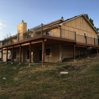 Ridgeline Construction Services - This beautiful deck was just half this size till we redid it! - General Contractors Near Me