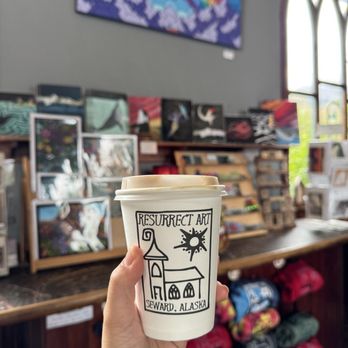 Resurrect Art Coffee House Gallery - 12 oz - Coffee & Tea Near Me - Seward, Alaska Resurrect Art Coffee House Gallery - 12 oz - Coffee & Tea Near Me - Seward, Alaska