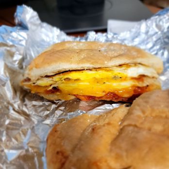 A & M Coffee Express - Two egg and cheddar with hot sauce/ketchup - Food Trucks Near Me - New York, New York A & M Coffee Express - Two egg and cheddar with hot sauce/ketchup - Food Trucks Near Me - New York, New York