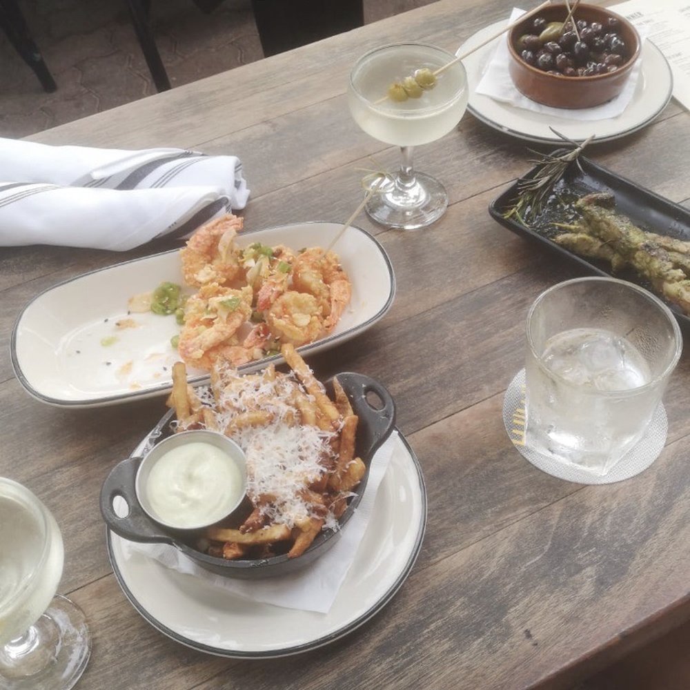 Fancy Drake Fries, shrimp, lamb skewers, bowl of olives and vermouthy martini