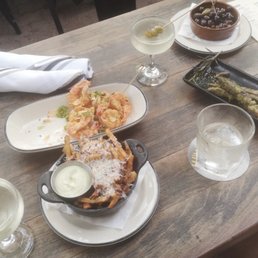 Fancy Drake Fries, shrimp, lamb skewers, bowl of olives and vermouthy martini Fancy Drake Fries, shrimp, lamb skewers, bowl of olives and vermouthy martini