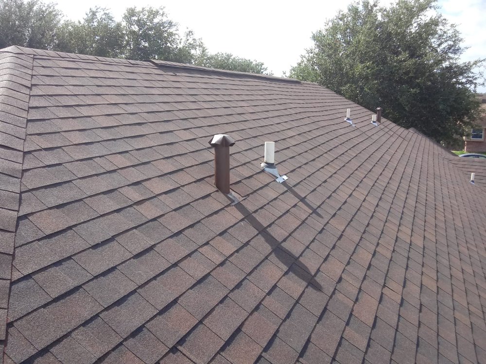 Slide of Martinez Roofing and Restoration