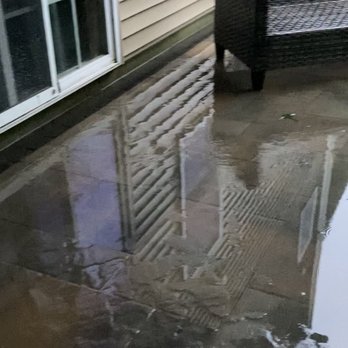 Furtado Landscaping - Patio not pitched correctly - Landscaping Near Me - Dartmouth, Massachusetts Furtado Landscaping - Patio not pitched correctly - Landscaping Near Me - Dartmouth, Massachusetts