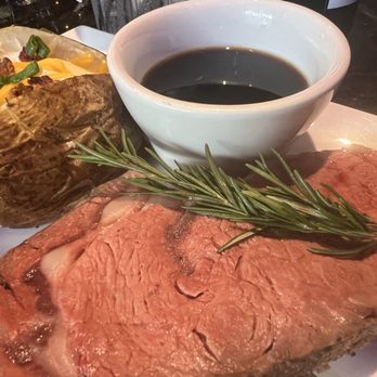 Jonathan's Grille - Prime Rib with loaded baked potato - American Near Me - Mount Juliet, Tennessee Jonathan's Grille - Prime Rib with loaded baked potato - American Near Me - Mount Juliet, Tennessee
