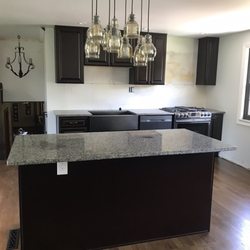 Budget Kitchen and Bath - New cabinets and granite / espresso cabinets and oyster pearl granite