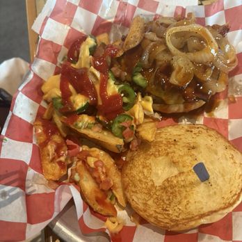 Fuddruckers - 1/3lb Bourbon Burger, Fries topped with cheddar cheese and jalapeños. - American Near Me - Norfolk, Virginia Fuddruckers - 1/3lb Bourbon Burger, Fries topped with cheddar cheese and jalapeños. - American Near Me - Norfolk, Virginia