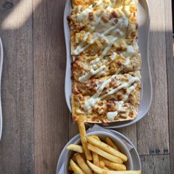 The Line on 59 - Chicken Bacon Ranch on Flatbread with a side of fries.