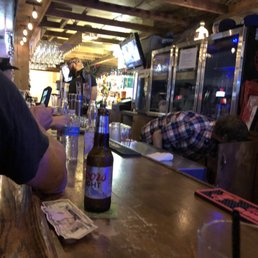 man sitting at a bar man sitting at a bar