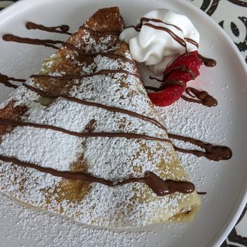 Sexy Kitchen - a plate of food with powdered sugar and whipped cream - Cafes Near Me - West Palm Beach, Florida Sexy Kitchen - a plate of food with powdered sugar and whipped cream - Cafes Near Me - West Palm Beach, Florida