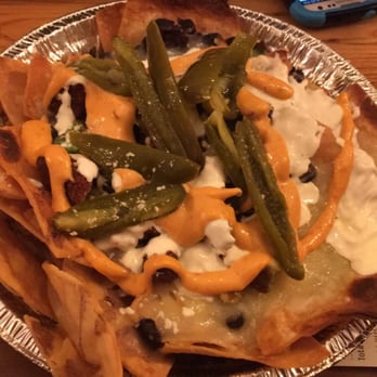 Tacoria - Nacho pie with golden avocado (fried avocado) - Tex-Mex Near Me - New Brunswick, New Jersey Tacoria - Nacho pie with golden avocado (fried avocado) - Tex-Mex Near Me - New Brunswick, New Jersey